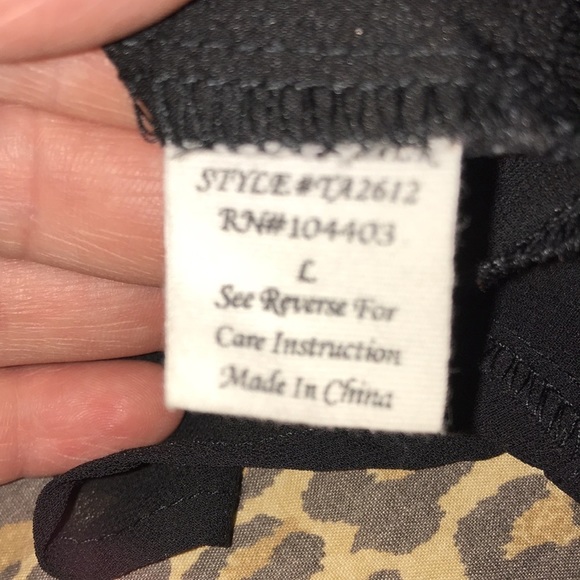 Black  large semi sheer front solid black sleeveless button down top - Picture 9 of 13